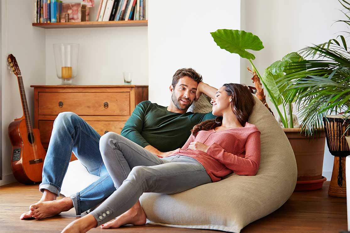 happy couple inside home