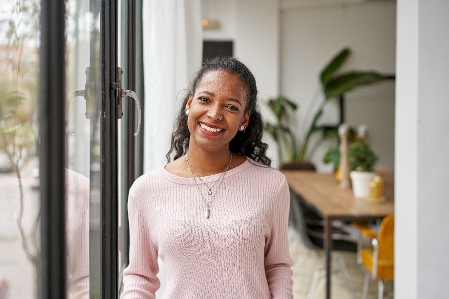 A woman smiling