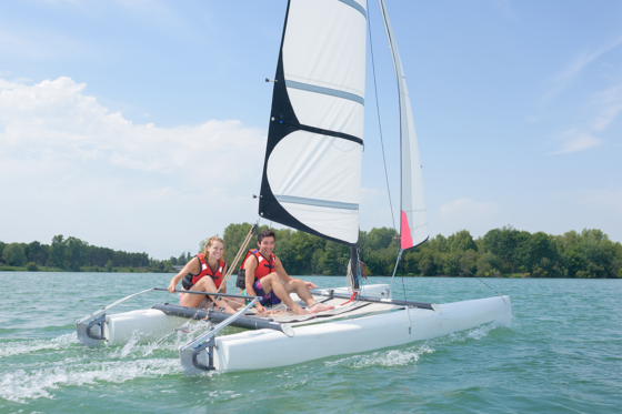 couple on catamaran