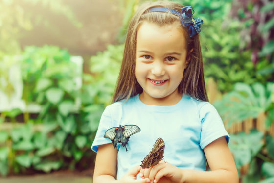 butterflies with little girl