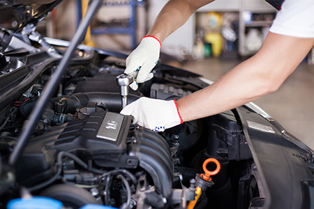 Mechanic fixing a car