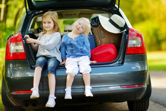 two girls auto trunk