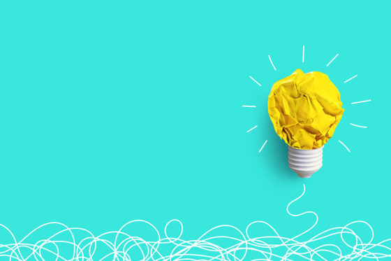 A lightbulb on a blue background