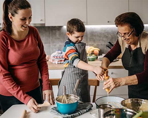 three generations cooking together