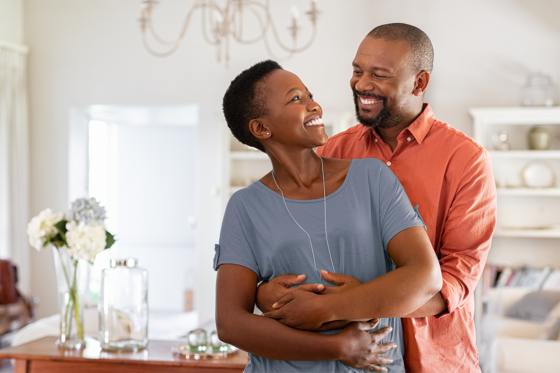 happy adult couple in home