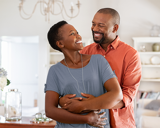 happy adult couple in home