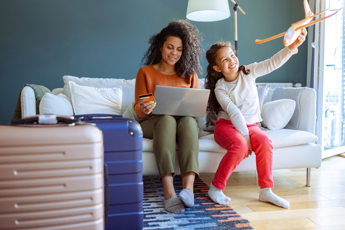 woman laptop child vacation