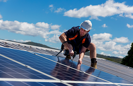 Solar Installer on Roof