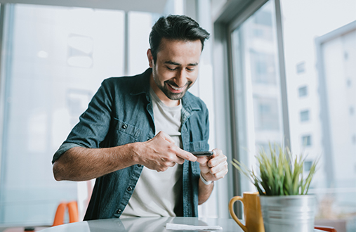 Man clicking on phone